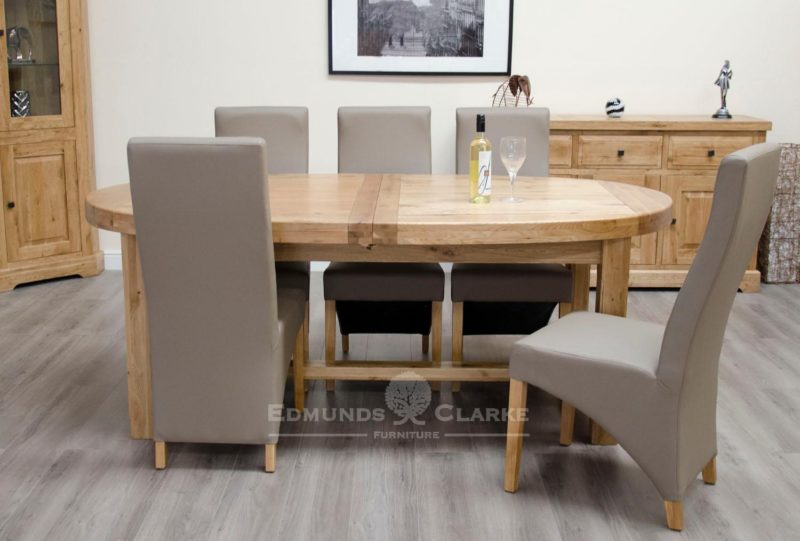 Melford solid oak super oval extending dining table. extending from 210cm to 250 to 290, 100% deluxe solid oak, seats 6 to 10 , tow leaves measuring 40cm each