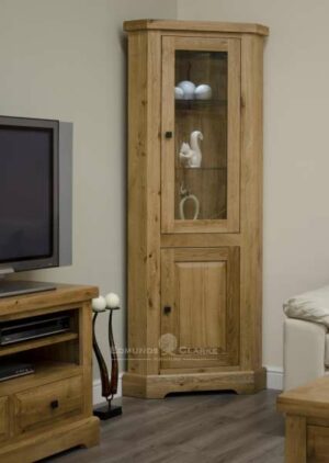 Melford deluxe solid oak corner display unit. deluxe chunky rustic solid oak corner display unit with glass door to upper and two glass shelves within and one door with one shelf and choice of knobs DLXCORDU
