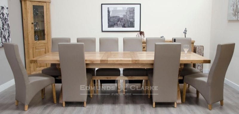 Melford Solid Oak 2400 Extending Dining Table chunky, showing 1 leaf that store underneath will sit 8 to 12 people comfortably DLX2400EXT