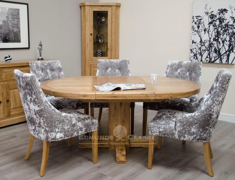 Melford solid oak round extending table chunky 165cm one leaf that stores underneath will sit 4 to 6 people comfortably DLXRNDEXT