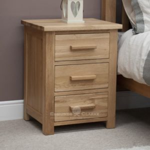 Bury Solid Oak 3 Drawer Bedside Chest. Light lacquer oak with choice of bar handles