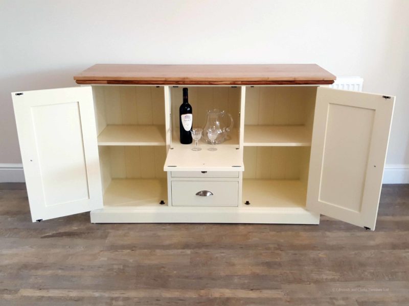 Edmunds painted drinks cabinet sideboard. Moulded oak top, centre drop down door and drawers under and 2 doors either side. choice of handles. EDM039