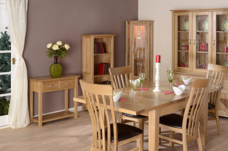 Image of room set Norwich oak dining furniture, table and 4 toulouse chairs, 2 drawer console table, bookcase, corner display unit, 4'6 dresser by edmunds & clarke furniture