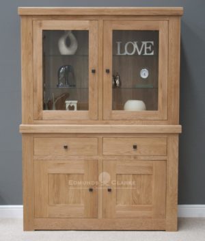 Hadleigh solid oak chunky small glazed dresser. light lacquer with rustic square knobs. adjustable glass shelves at top