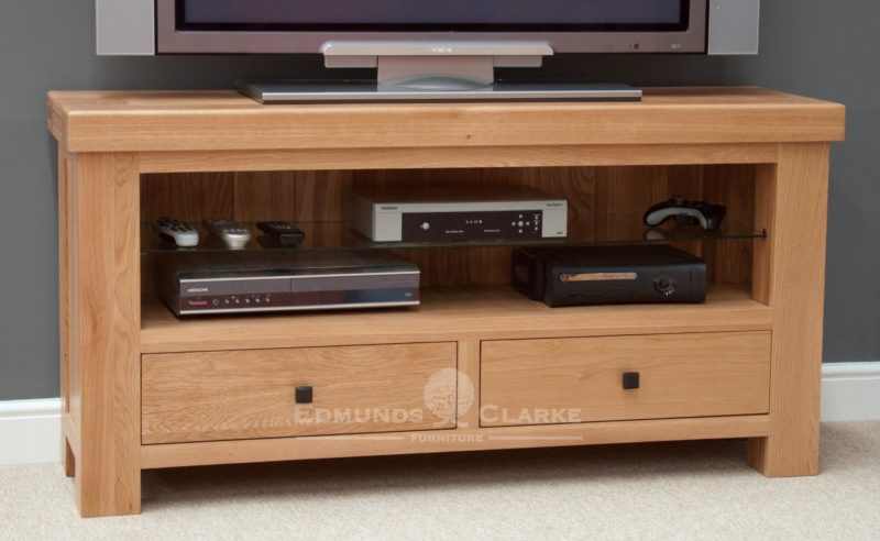 Hadleigh Solid Oak TV Unit. Chunky shaker style with toughened glass shelf and 2 handy drawers under. choice of handles available