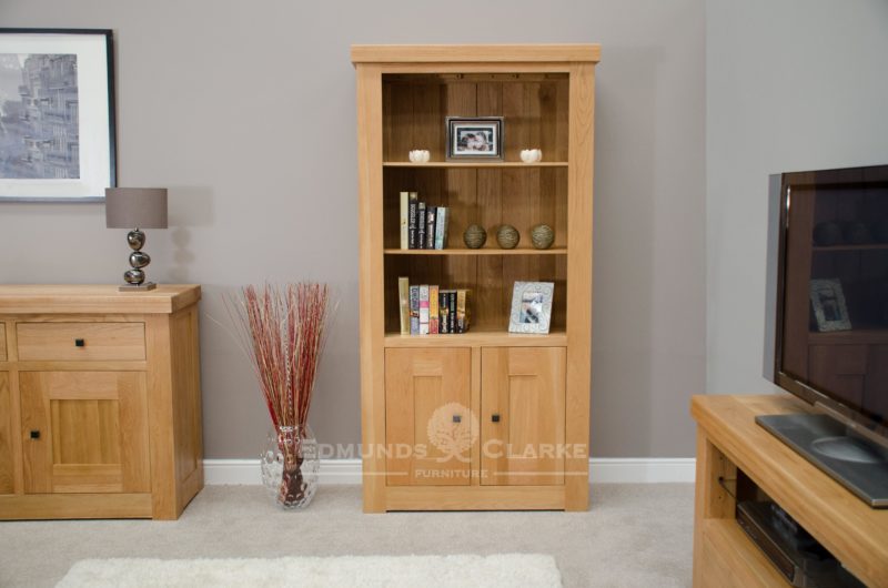 Hadleigh solid oak chunky 2 door bookcase with adjustable shelves in a light oak finish and rustic handles