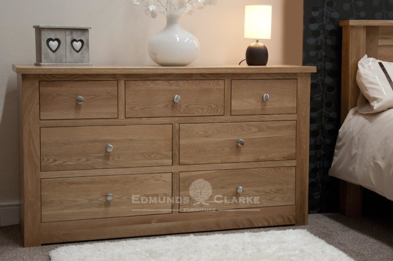 solid oak seven drawer low chest, 141cm wide by 81cm high