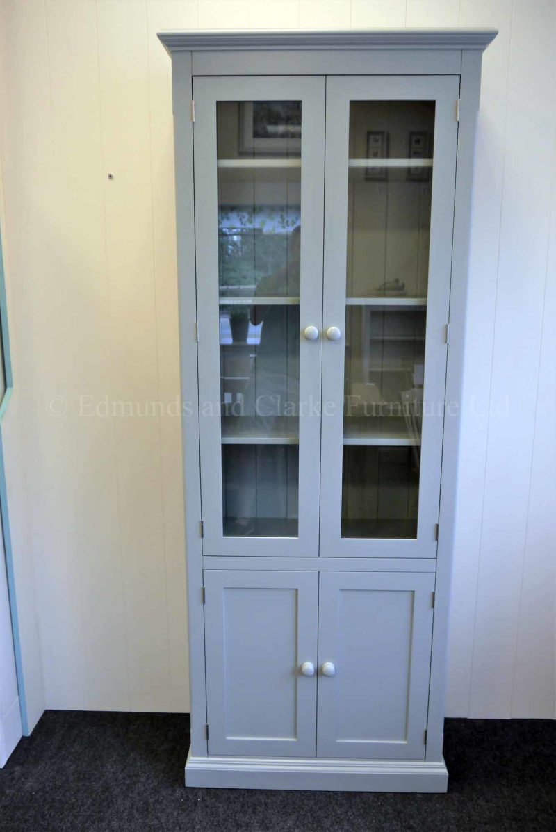 Edmunds tall narrow glazed bookcase with four doors