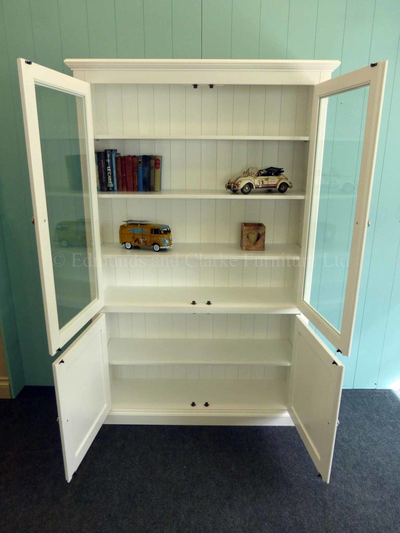 Edmunds painted white glazed and paneled bookcase, adjustable shelves