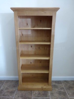 Edmunds Pine Shallow Depth Bookcases. Image shows tall narrow style bookcase with 4 adjustable shelves waxed pine finish all over. many finishes and sizes available