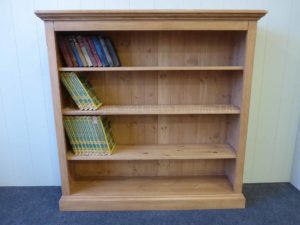Edmunds pine Standard Depth Bookcases. image shows pine all over including the shelves, nouled top and cornice. many sizes available