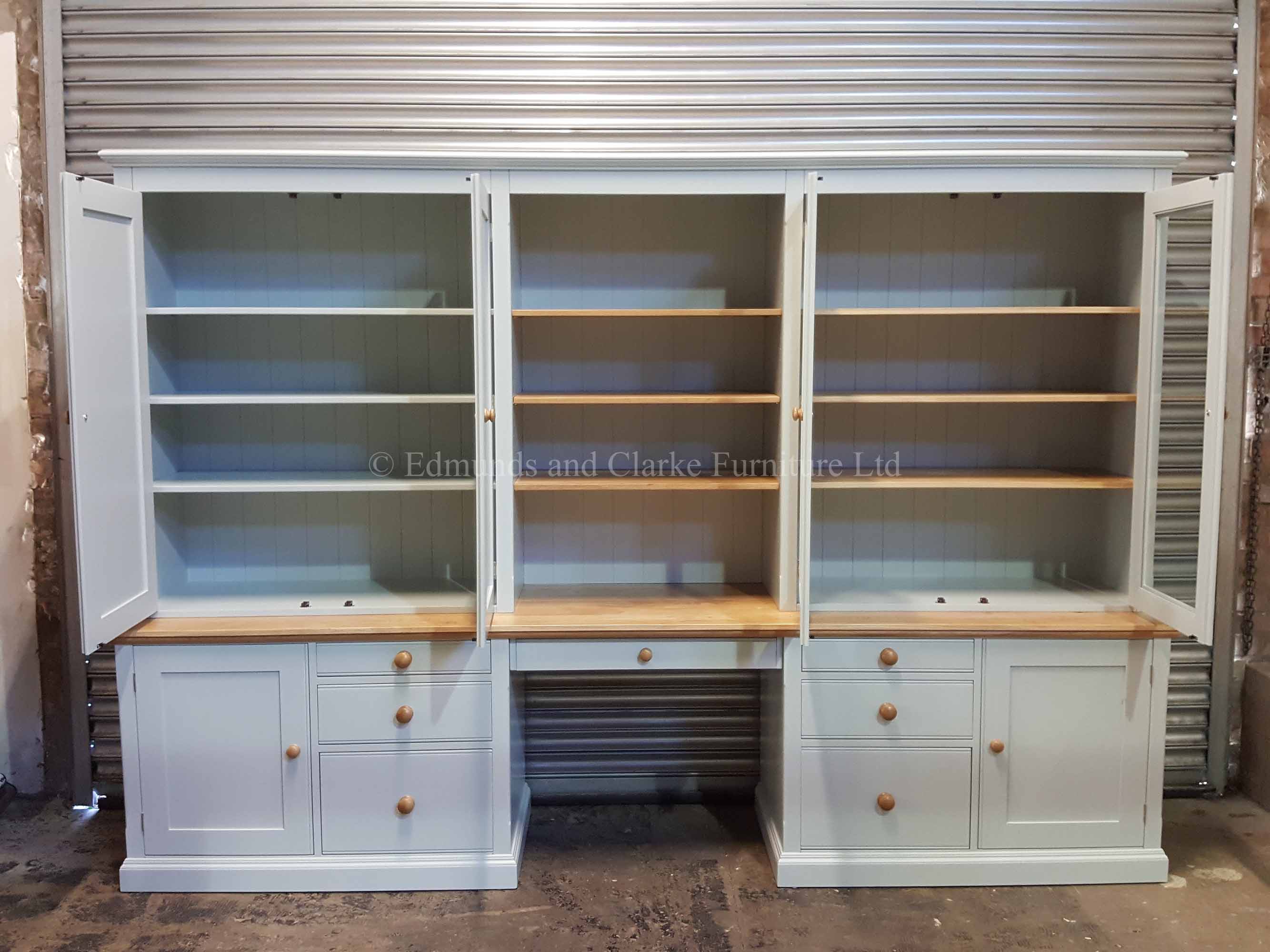 Workstation made to measure with foolscap filing drawers, pull out slides and adjustable shelves