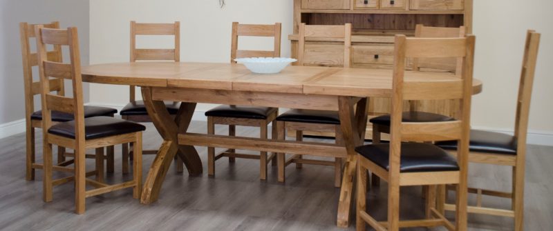 Melford solid oak cross leg oval extending table with two leaves