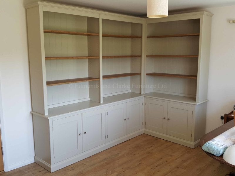Made to measure corner library bookcase, cupboards below adjustable shelves above