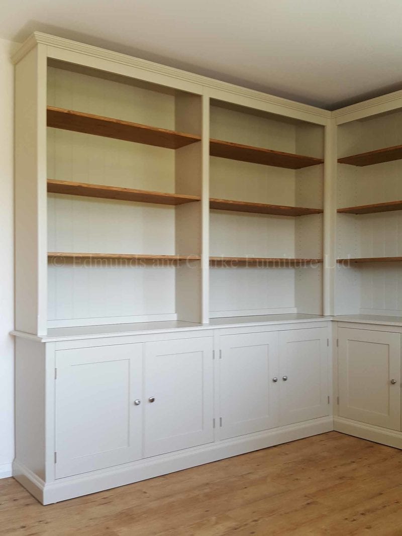 Painted corner bookcase with cupboards below, can be made to measure