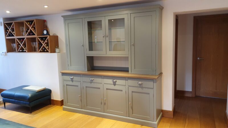 Bespoke kitchen large 4 drawer kitchen dresser with glazed centre racking. Edmunds & Clarke Furniture