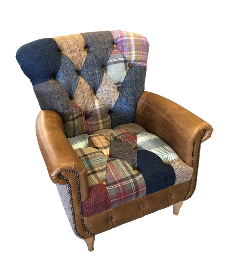 Vintage Sofa Co Gotham Harlequin Fast Track Chair in patchwork harris tweed and wool fabric with cerato brown leather arms and detailing on turned oak legs cutout