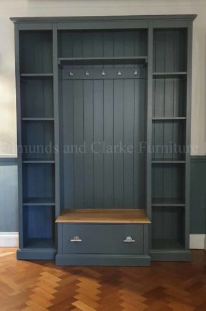 Painted hallway shelving and shoe storage with large drawer