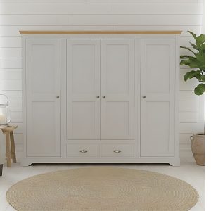 Clarke Quad wardrobe with 2 drawers at bottom room set. Edmunds Clarke Furniture