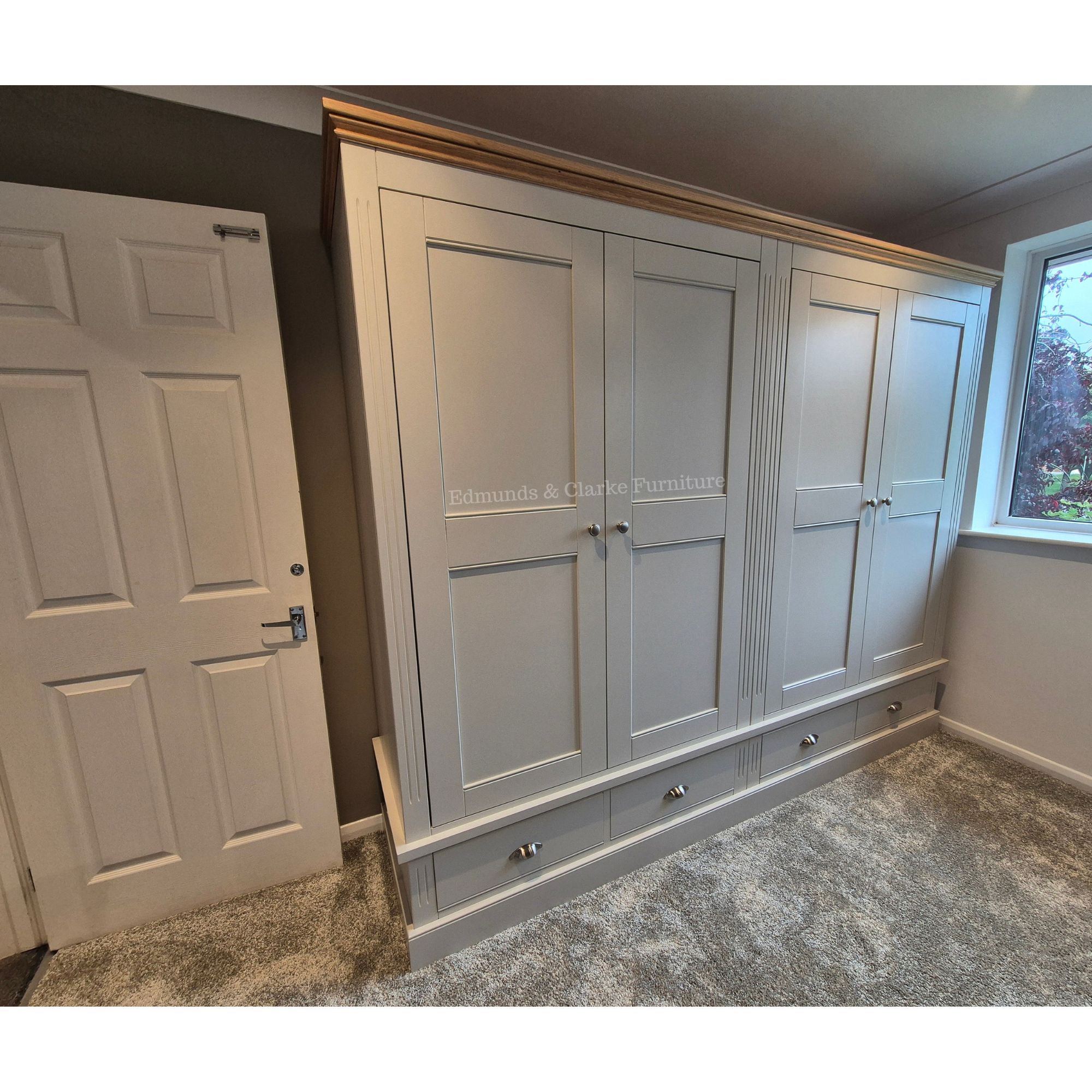 Clarke Quad wardrobe colour Trevi with 4 drawers below doors. Edmunds Clarke Furniture