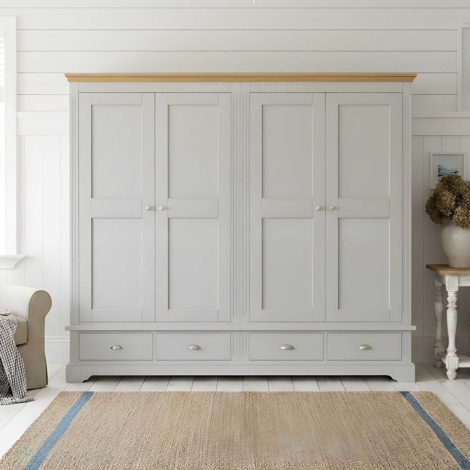 Clarke quad wardrobe with 4 drawers under room shot. Edmunds Clarke Furniture