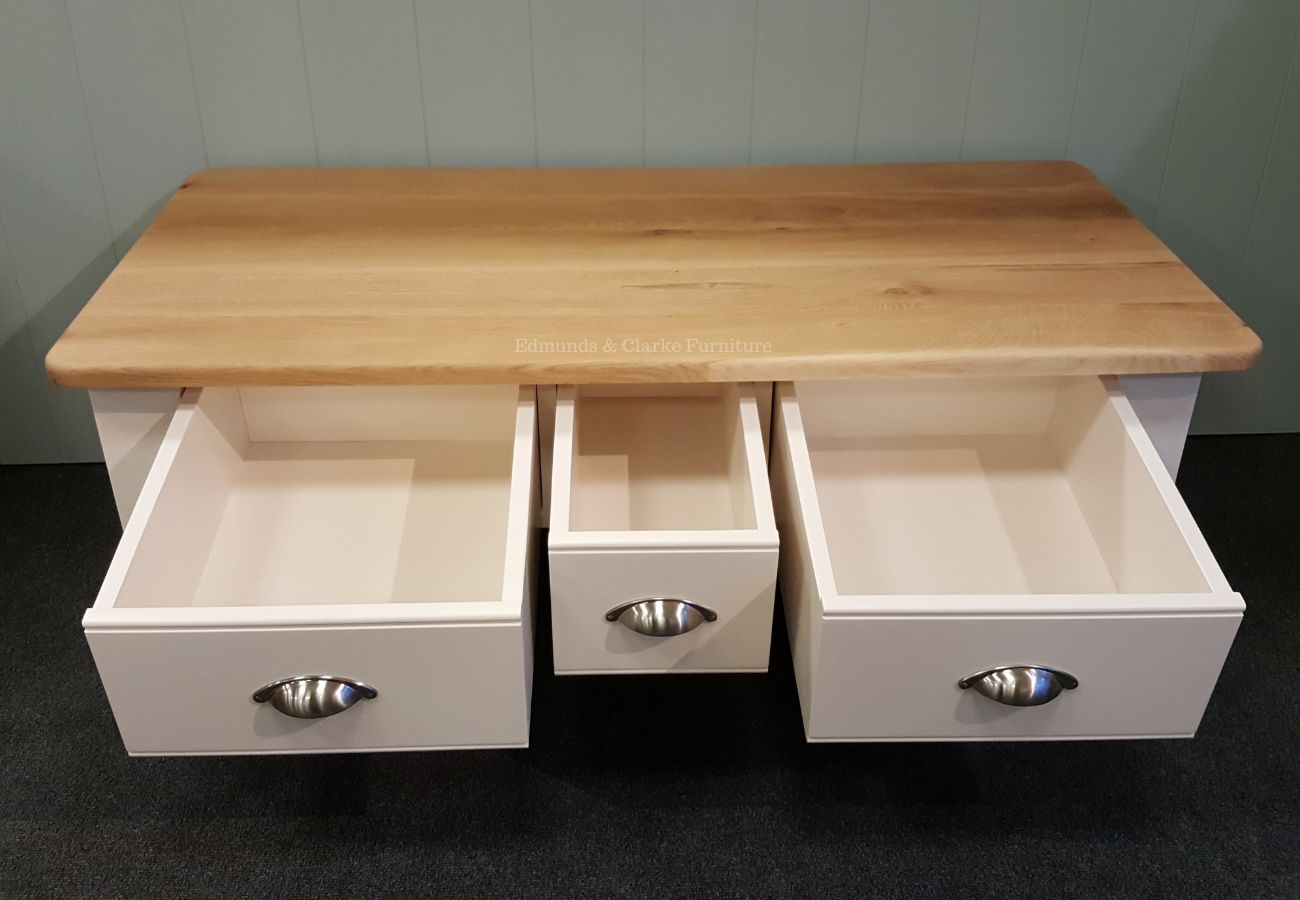 EDMCTFHLG Edmunds Farmhouse Coffee Table with 3 drawers open, oak top and painted turned legs - Large. Edmunds & Clarke Furniture