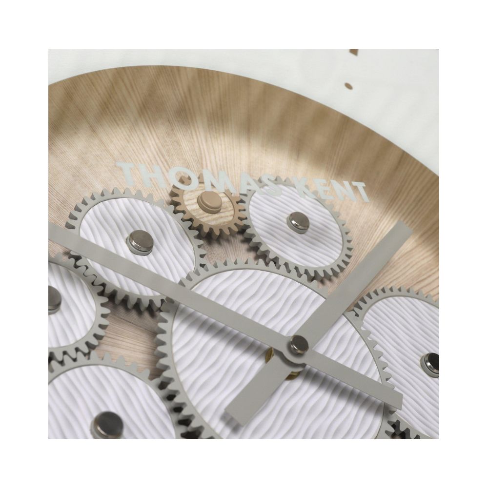 Thomas Kent Clocksmith Grand Clock Ivory close up. A large wall clock showing the working mechanisms in the centre. Edmunds & Clarke Furniture