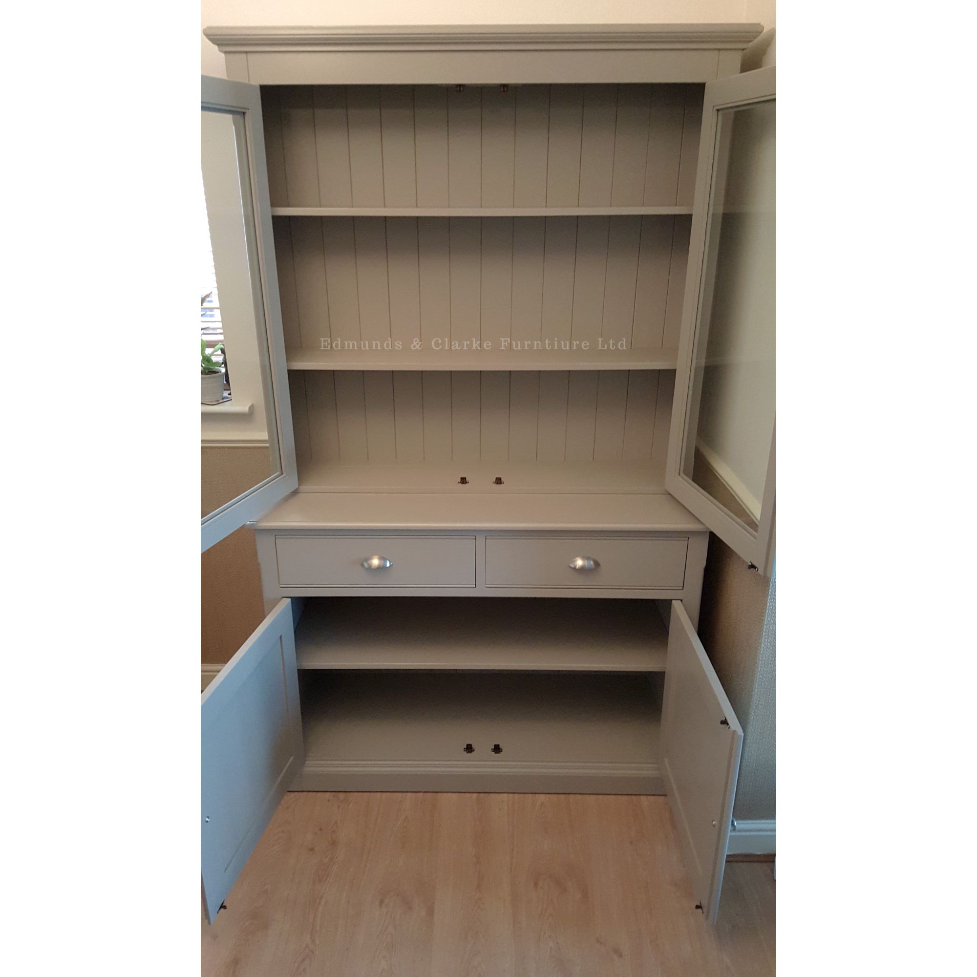 Edmunds fully glazed dresser 2 drawer painted all over doors open. Edmunds & Clarke Furniture