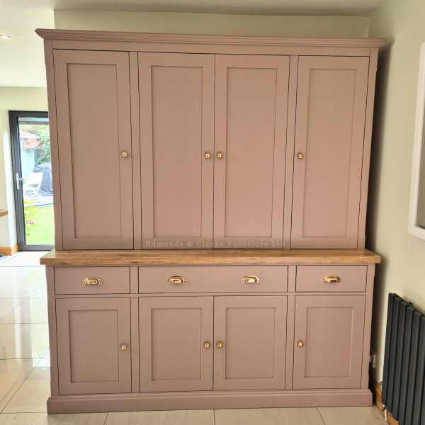 Bespoke larder cupboard with bifold door old rose colour and lights