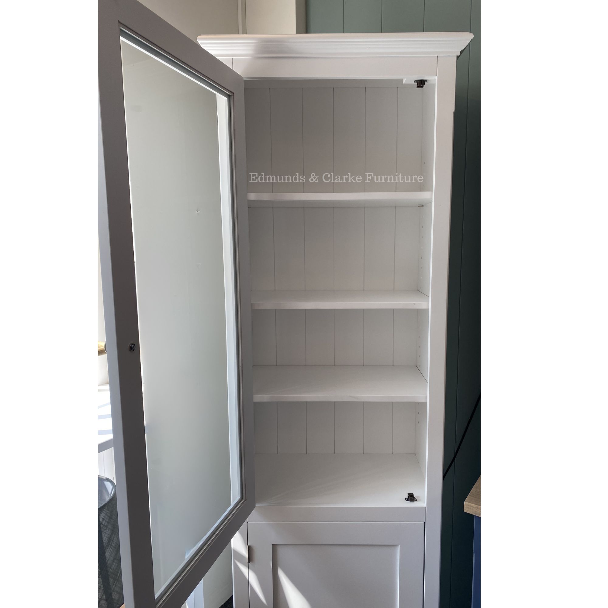 SWIFT Edmunds Single Glazed Bookcase white doors open. Edmunds Clarke Furniture