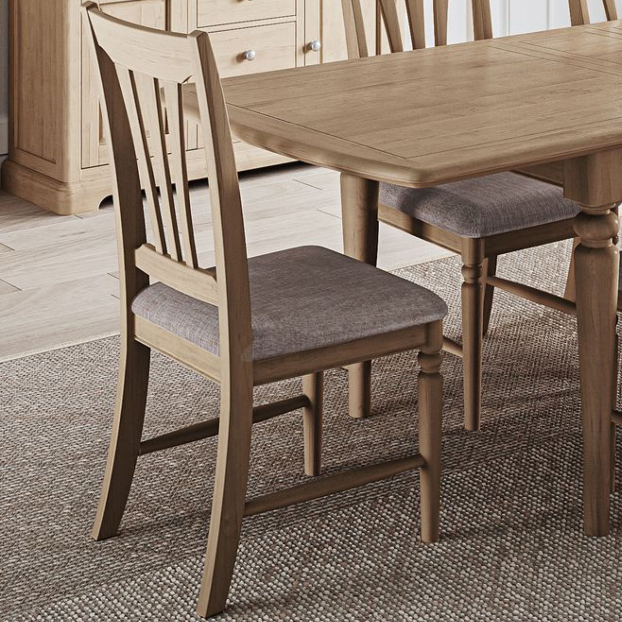 BOK101 Barton Oak dining chair with pad - room set. Edmunds Clarke Furniture
