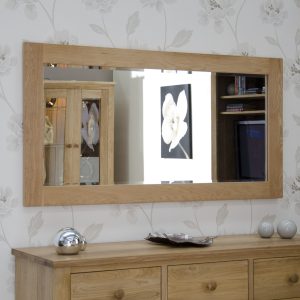 rectangular oak wall mirror with beveled glass in room setting