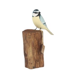 Blue tit carving on stump front view. Edmunds Clarke Furniture