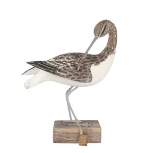 Curlew carving preening side view. Edmunds Clarke Furniture