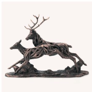 Driftwood running deer bronze sculpture. a deer and doe running. Edmunds Clarke Furniture