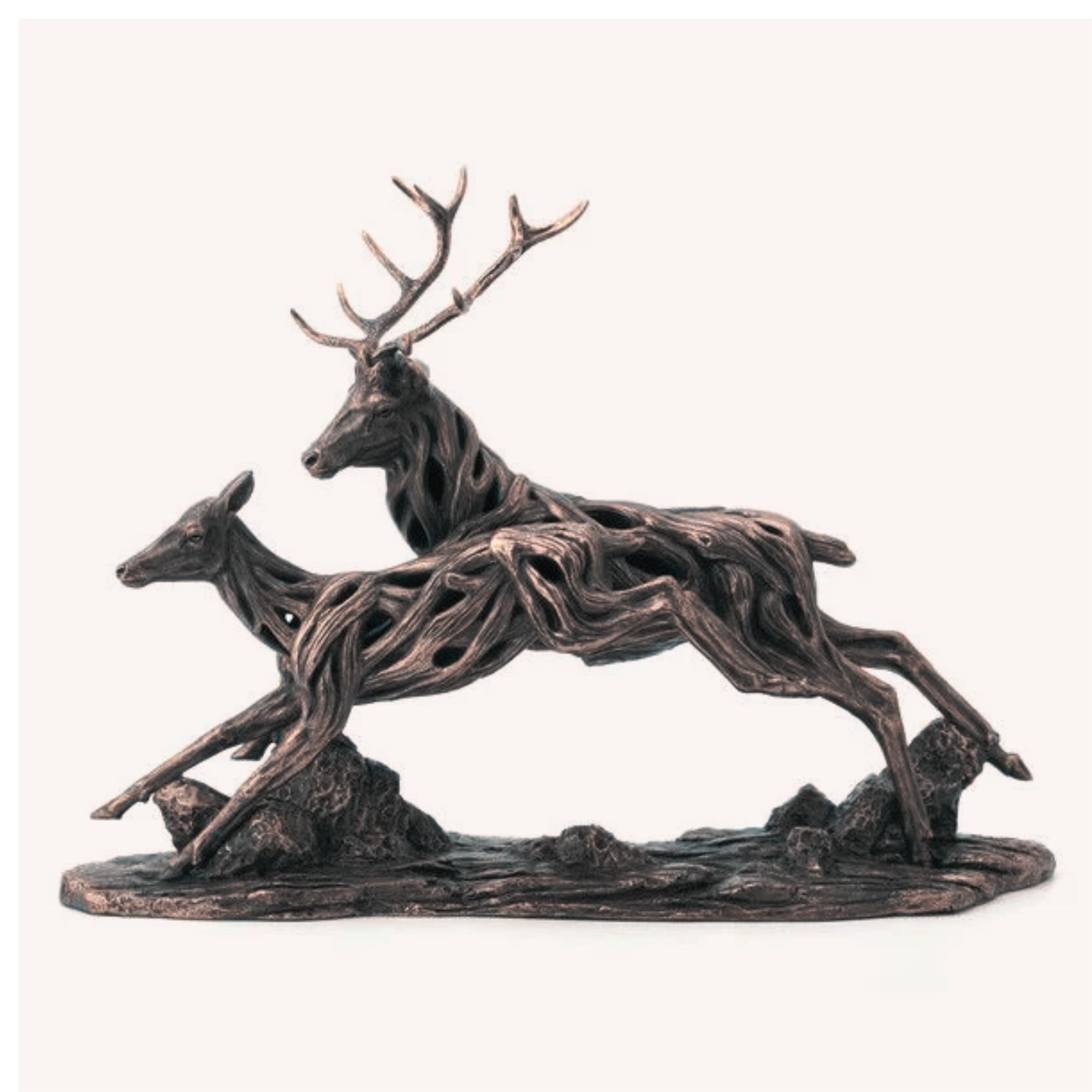 Driftwood running deer bronze sculpture. a deer and doe running. Edmunds Clarke Furniture