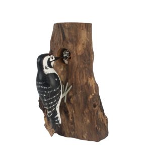 Lesser spotted woodpecker carving front. Edmunds Clarke Furniture