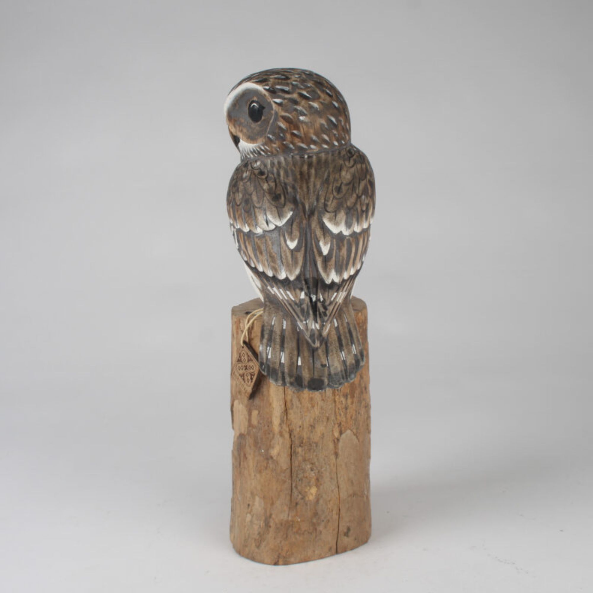 Little Owl carving on wood block back. Edmunds Clarke Furniture