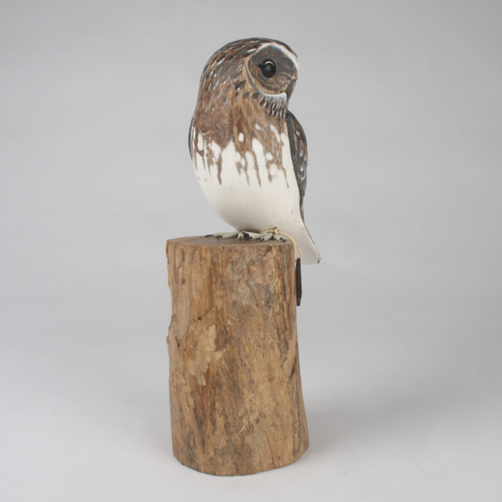 Little Owl carving on wood block side. Edmunds Clarke Furniture