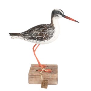 Redshank Straight wooden carving standing on a piece of driftwood. Edmunds Clarke Furniture
