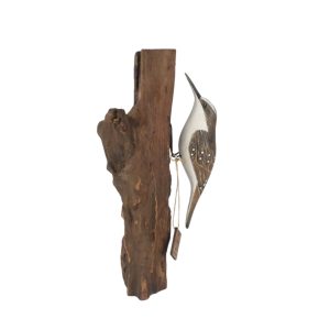Tree creeper carving bird on wood stump. Edmunds Clarke Furniture