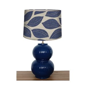Tula Ceramic Lamp Table Base with Pemberley Navy leaf lamp shade. Edmunds Clarke Furniture
