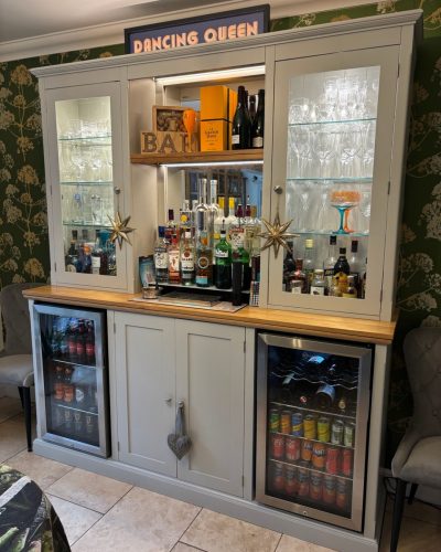 Edmunds Drinks dresser with 2 coolers. Customer own image showing colourful bottles and decor